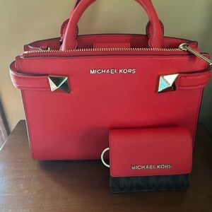 Michael Kors hand bag with matching wallet